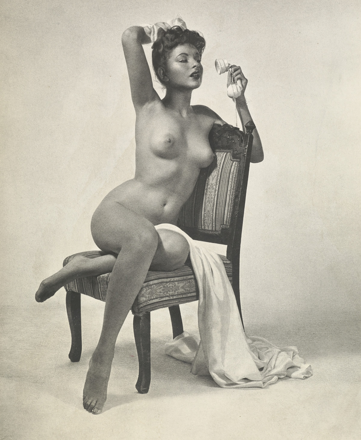 WILLIAM H. MORTENSEN (1897-1965) Nude with telephone.